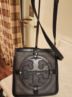 Tory Burch Holly crossbody bag featuring a black and gray design with the Logo